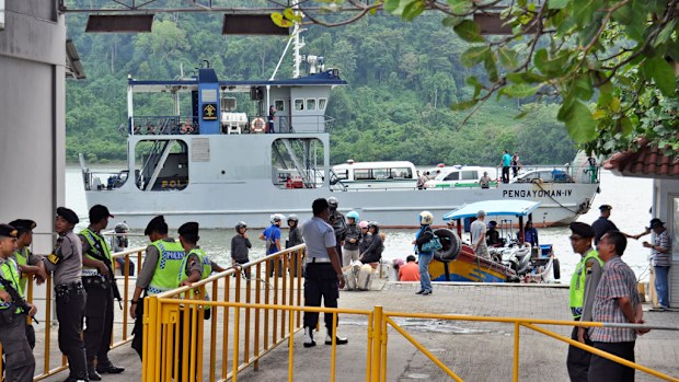 A ferry carrying ambulances sets off for Nusakambangan Island where the executions of the five of six drug convicts were performed. (AAP)