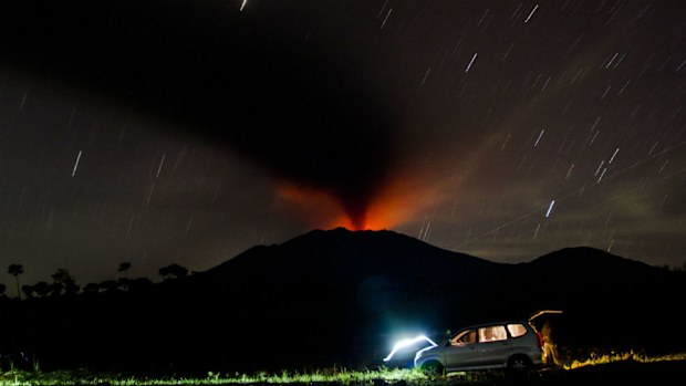Mount Raung spews volcanic ash as seen from Sumber Arum village in Banyuwangi, East Java. (EPA/FULLY HANDOKO)