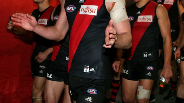 Essendon players may be offered reduced six month bans if they admit to taking performance enhancing substances. (AAP/Mark Dadswell)