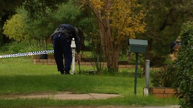 Police are still searching for the alleged murder weapon. (9NEWS)