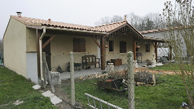 The house where the bodies of five babies were discovered by police in Louchats. (Getty)