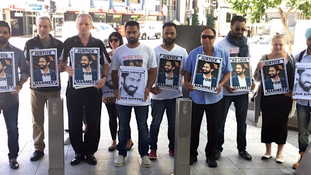 Supporters of Manmeet Alisher have rallied outside Brisbane Magistrates Court. (AAP)
