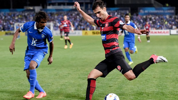 The Western Sydney Wanderers' Labinot Haliti lines up a kick. (AAP)