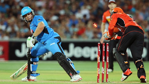 Craig Simmons of the Adelaide Strikers gets stumped by Sam Whiteman of the Perth Scorchers. (Getty)