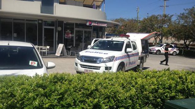 Police at the scene of the Red Rooster shooting. (9NEWS)