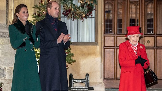 The Queen and the Duke and Duchess of Cambridge enjoy the performance.