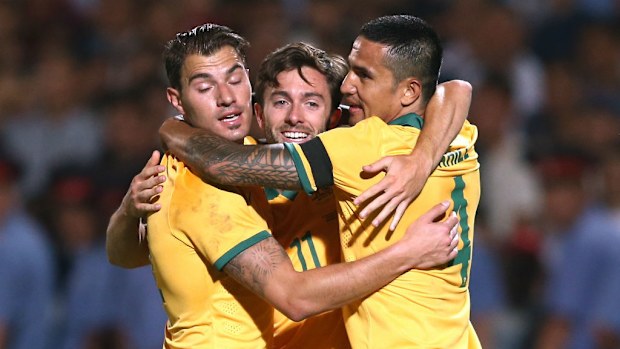 Socceroos players celebrate a goal against Kyrgyzstan. (Getty)
