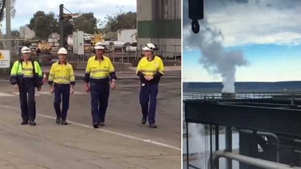 Workers leave the Port August power station. (Twitter / @JarradBrevi9)