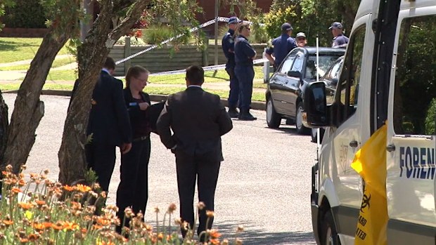 Forensic officers at the scene. (9NEWS)