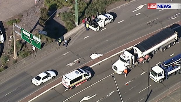 A motorcyclist has reportedly been killed after a collision with a truck in Sydney's southwest. (9NEWS)