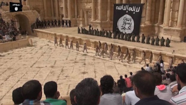 The slickly produced clip shows a crowd watching the executions. (Supplied)
