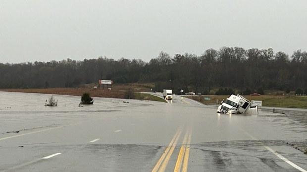 A tractor trailer sits submerged in flood water on US 63 just north of Cabool in Missouri.