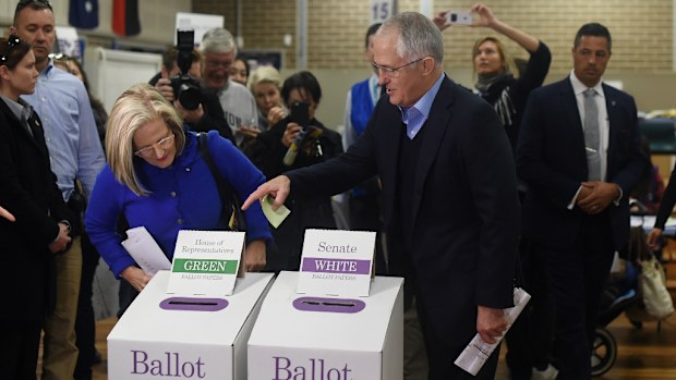Australian Prime Minister Malcolm Turnbull and his wife Lucy cast their vote at a voting booth in his electorate of Wentworth in Sydney. (AAP)