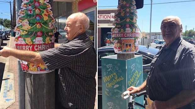 Eric applies his own Christmas decoration to a Mortdale lamp post. (Facebook/I Grew Up in Mortdale 2223)
