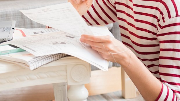 Woman using laptop at home