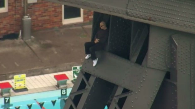 The man allegedly spent almost two hours on the bridge. (9NEWS)