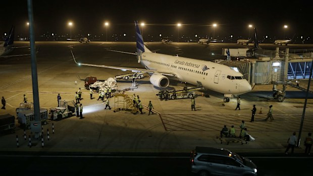 A Garuda Indonesia airplane parks on the tarmac on the first day of operations of the new Terminal 3 Ultimate at the Soekarno-Hatta airport in Jakarta. (AAP)