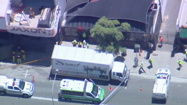 Police and paramedics at the scene, (9NEWS)