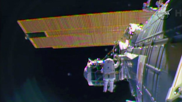 The two men outside the International Space Station. (AAP)