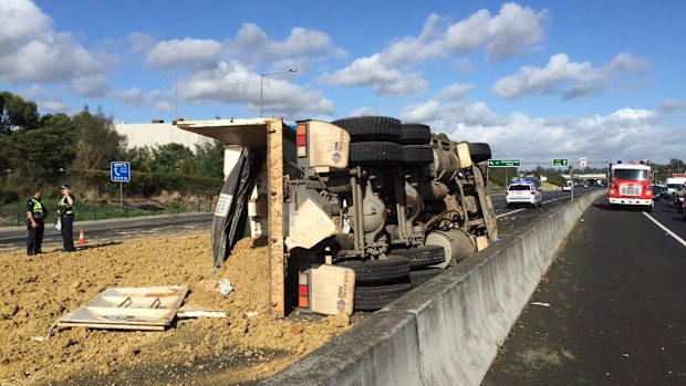 Four people have been injured after a truck collided with three cars before rolling over on Melbourne's Eastern Freeway. (Supplied)