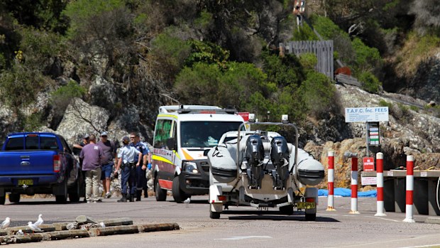 A man has died and four others have been rescued after being swept off the rocks at Tathra. (9NEWS)