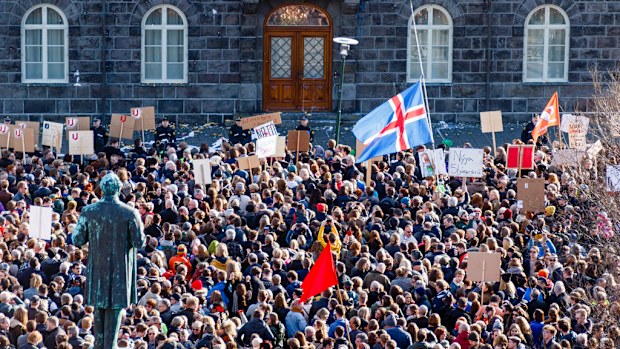 Thousands protest in front of the Icelandic Parliament in Reykjavic, Iceland, calling for the resignation of Prime Minister Sigmundur David Gunnlaugson – one of those named in the leak. (AAP)