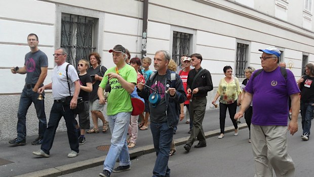 Members of the The Trans-Universal Zombie Church of the Blissful Ringing take part in a street march. (Supplied)