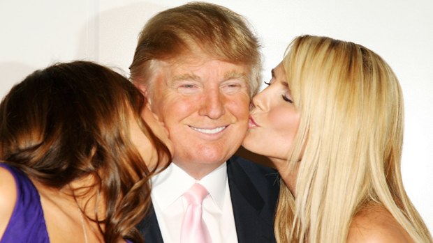 President Donald Trump with wife Melania and Heidi Klum in 2008. Image: Getty
