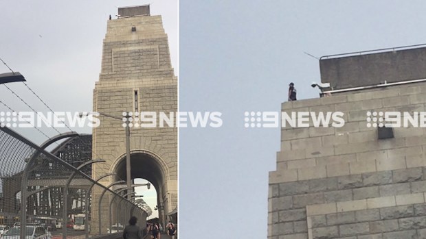 Footage shows a man standing atop part of the Sydney Harbour Bridge. (Supplied)