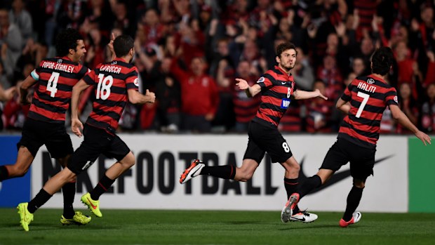 Mateo Poljak and his Wanderers teammates celebrate his goal during their ACL semi-final win at Parramatta Stadium. (AAP)