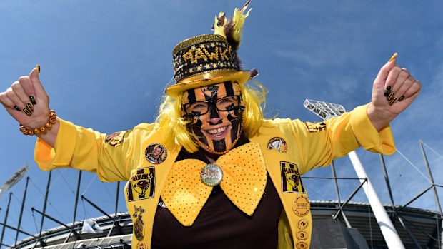 Hawks fan Theresa Dobbie wore a hat to block the sun at the MCG.  (AAP)