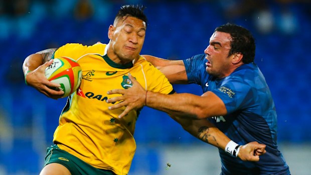 Israel Folau of the Wallabies with the ball. (Getty)