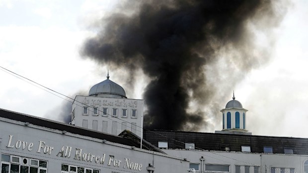 The scene at a fire at the Baitul Futuh Mosque in Morden, south London. (AAP)
