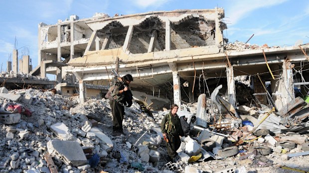 Kurdish fighters claim to have pushed ISIL militants out of the Syrian town of Kobane. (AAP)