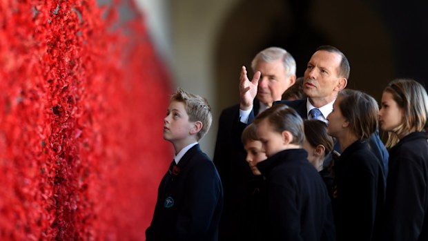 Prime Minister Tony Abbott and school students on a tour of the Australian War Memorial in Canberra, during the commemoration of the outbreak of WWI. (AAP)