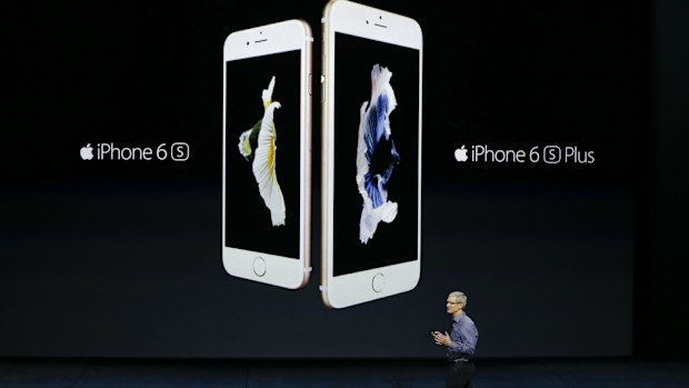 Apple CEO Tim Cook shows off the new IPhone6S and 6S Plus.