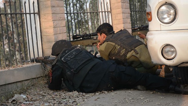 Pakistani soldiers take position around a school recently targeted by insurgents. (Getty Images)