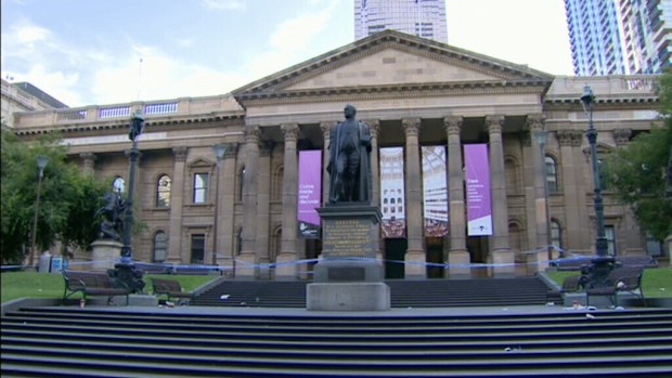 A crime scene has been established outside the State Library of Victoria. (9NEWS)