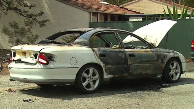 One of three cars destroyed in the arson attacks at Mile End. (9NEWS)