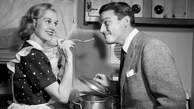 Housewife feeding her husband