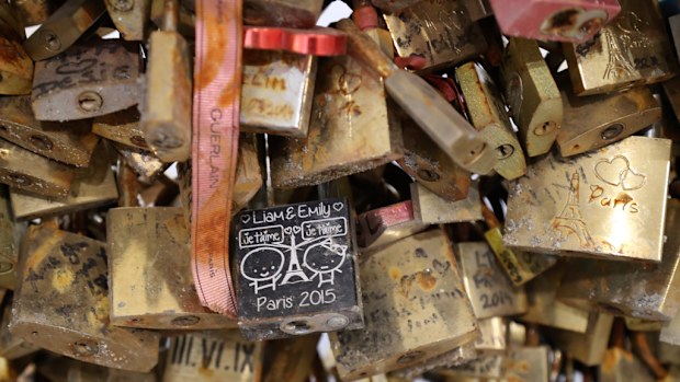 Padlocks locked and left as a symbol of love on Parisian bridges, displayed during an auction organised by the Ville de Paris. (AFP)