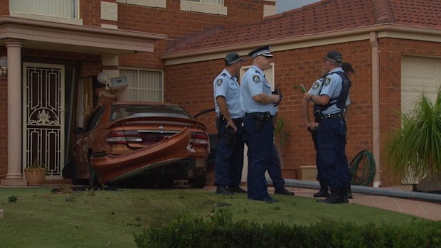 A man has crashed into a house after a high speed police pursuit in Sydney's southwest. (9NEWS)