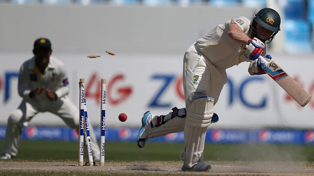 Australia's Chris Rogers is bowled by Imran Khan of Pakistan during day five of the First Test between Pakistan and Australia. (AP Photo)