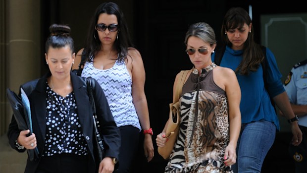 The lawyer and friends of one-punch victim Lucio Stein Rodrigues leave court. (9NEWS)