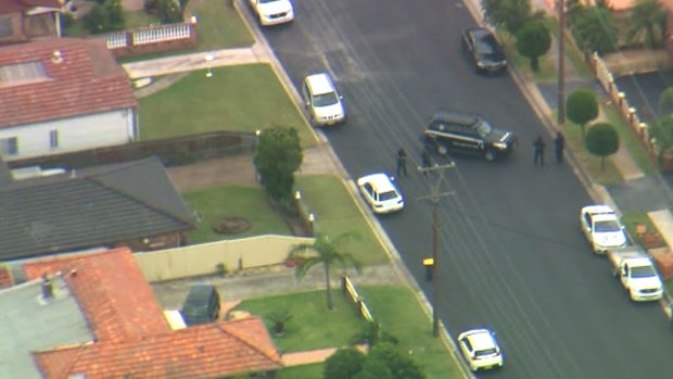 Police have blocked off a street in Merrylands. (9NEWS)