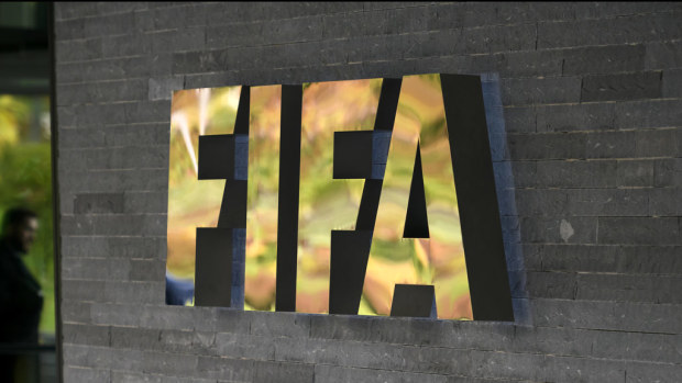A FIFA sign at the entrance of the world football's governing body headquarters in Zurich. (AFP)