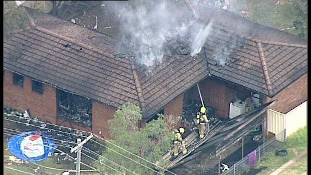 Three people were rescued from a house fire at Willmot, Sydney. (9NEWS)