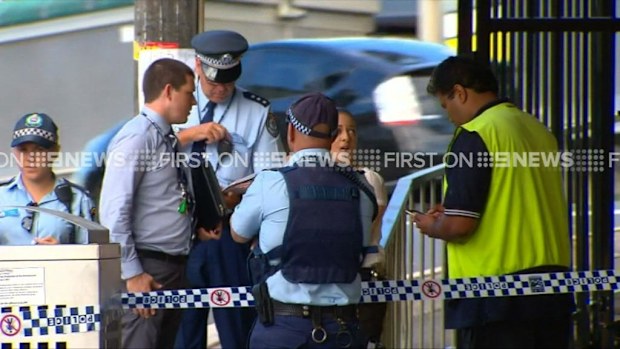 Police at the crime scene investigating the armed robbery of a delivery driver in Punchbowl (9NEWS)