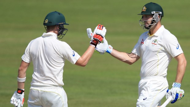 Steve Smith congratulates Shaun Marsh on his century. (AAP)