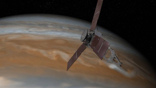 This artist's rendering shows NASA's Juno spacecraft making one of its close passes over Jupiter. (NASA)